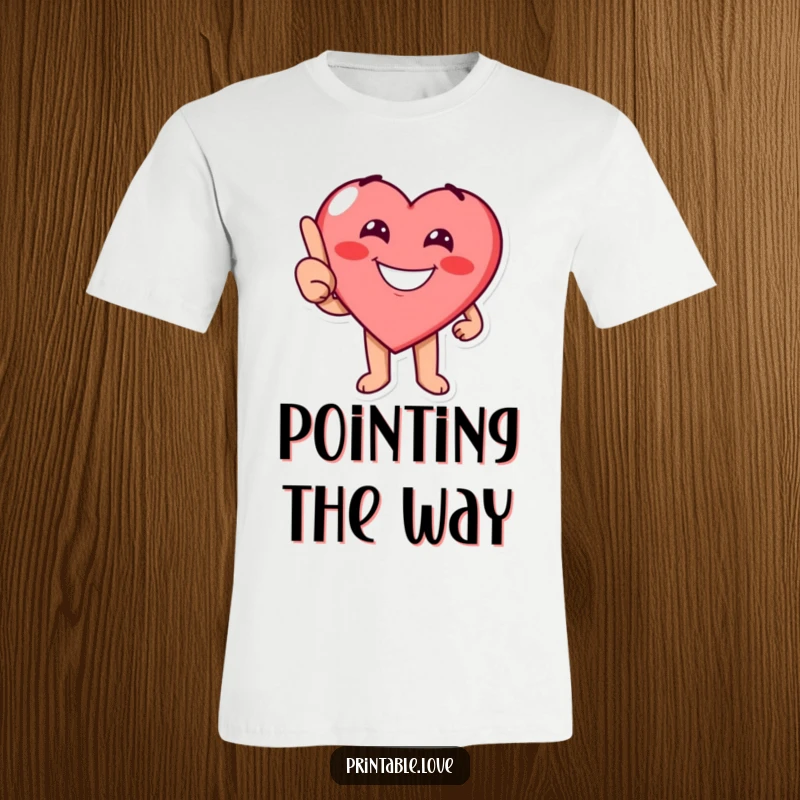 Funny heart character with a cheerful grin playfully pointing on a t-shirt, perfect for expressing direction and joy.